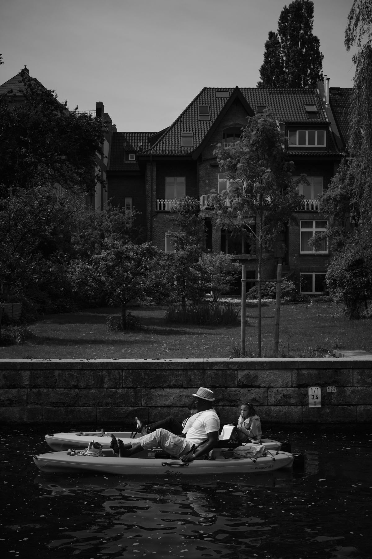 Canoe on a canal in front of old villas