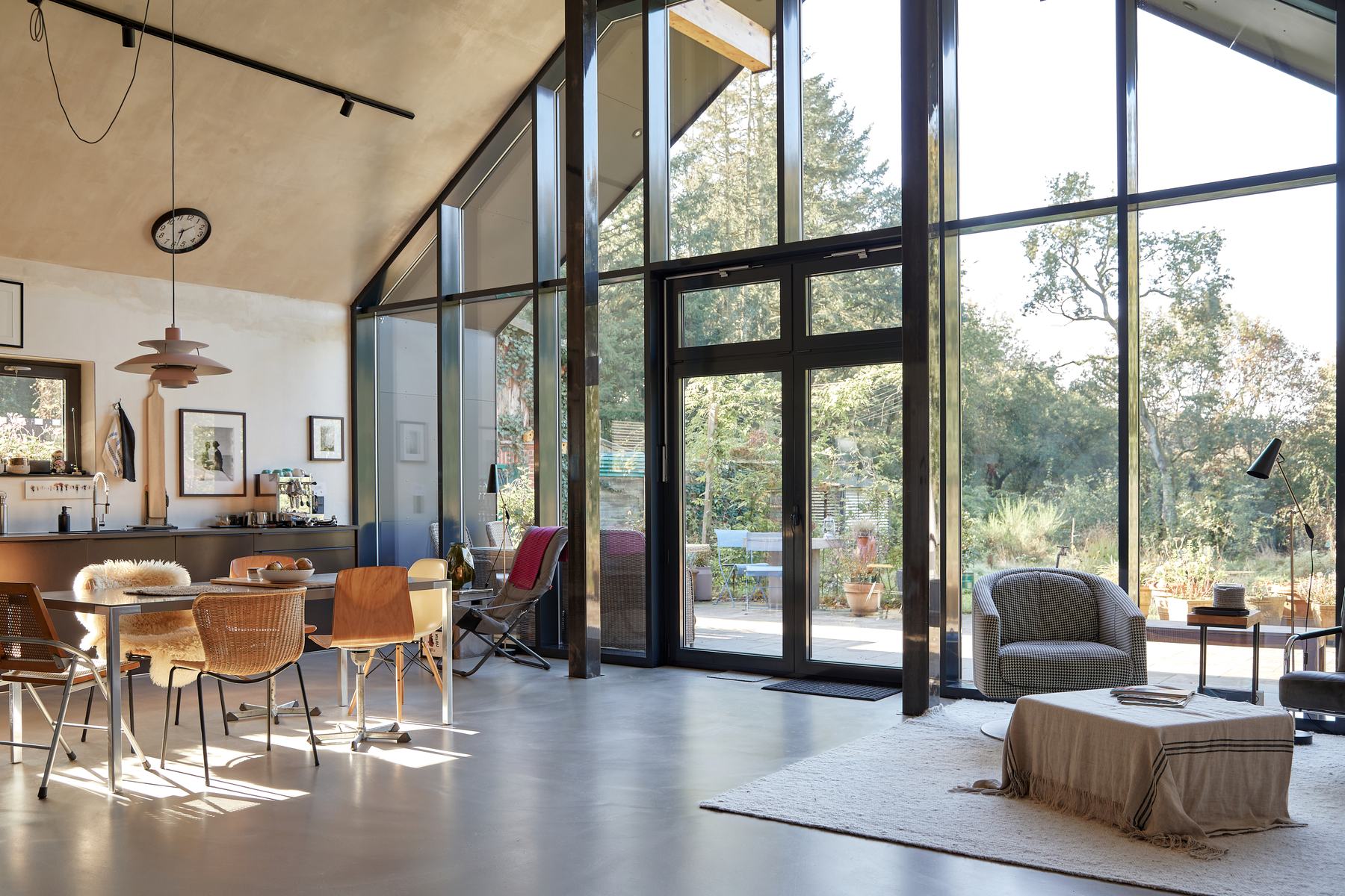 Living room with a tall glass facade